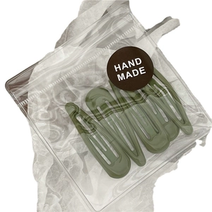 Olive green marble texture teardrop snap hair clips set in transparent packaging
