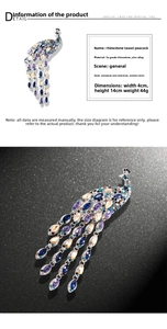 Macro detail of rhinestone peacock brooch showing zinc alloy frame and 4x14cm dimensions