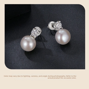 Macro shot of S925 sterling silver hallmark on freshwater pearl and moissanite earrings