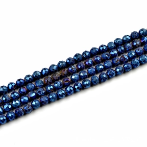 Macro shot of 10mm faceted deep blue agate beads with natural stone texture for DIY jewelry