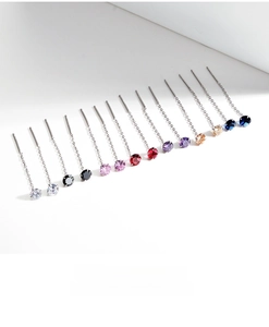 Detail of S925 sterling silver long tassel earrings with multi-color zircon stones
