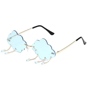 Lunettes de soleil nuage sans monture pour femmes avec verres bleus et breloques dorées