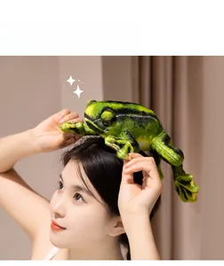 Funny green frog plush toy placed on a person's head for a playful creative gift look