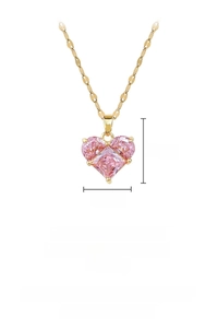 Detail of pink heart pendant with gold titanium chain showing 40+5cm length specs