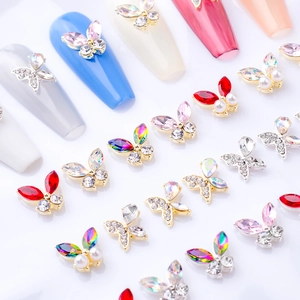Détails de bijoux à ongles papillon 3D avec strass colorés et perles en alliage