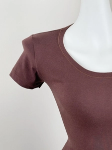 Detail of crew neckline and reinforced stitching on a slim dark brown short sleeve t-shirt