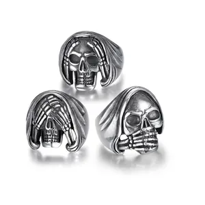 3D gothic punk skull rings set in stainless steel with antique finish and mirror reflection