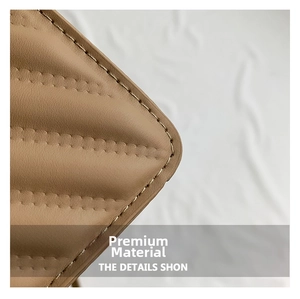 Detailed close-up showing high-quality stitching on the quilted coffee leather handbag