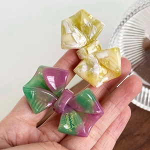 Acetate bow hair clips in yellow and marble purple with France handmade gold logo
