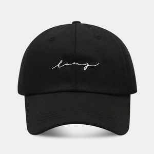 Classic black cotton baseball cap with white love embroidery and curved brim for sun protection