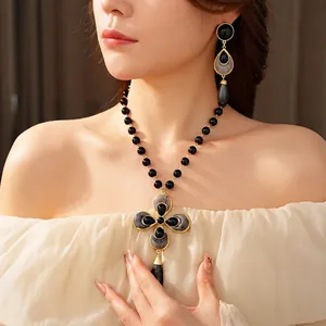 Vintage floral jewelry set with black beaded necklace and marble drop earrings for women