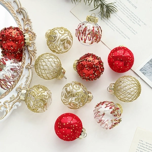 Red and gold 5cm Christmas ball ornament set with glitter and mesh texture on pine branches