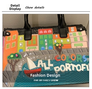 Close-up of Portofino collage embroidery and luxury crystal details on a leather bag