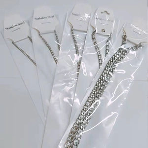Set of five silver stainless steel Cuban link chains in various widths and lengths