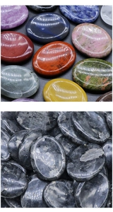 Macro shot of polished oval natural stones and colorful labradorite crystals for massage