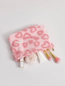 Trousse à maquillage rose en peluche avec motifs de cœurs 3D et fermeture éclair