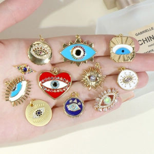 Set of DIY gold plated evil eye charms with micro-pave crystals and colorful enamel inlays