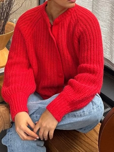 Women's casual red knit cardigan with long sleeves and buttons for a minimalist style