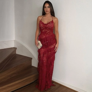 Detail of dark red lace halter dress showing multi-layered ruffles and slim fit design