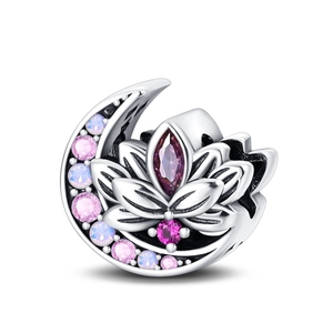 Detail of silver crescent moon and lotus pendant with pink and purple gemstones