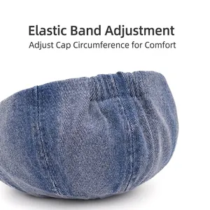 Adjustable denim newsboy cap with elastic back strap and vintage twill texture