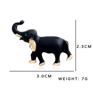 Vintage elephant brooch in black enamel and gold finish, 2.3cm height and 3.0cm length