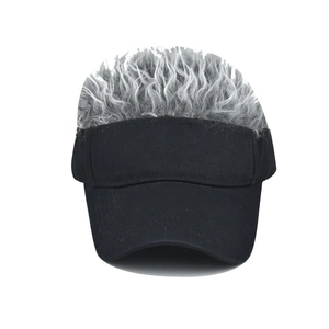 Detail of the grey synthetic wig texture attached to a black cotton baseball cap