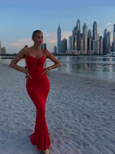 Elegant red backless fishtail evening dress with floral shoulder strap details