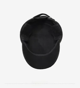 Detail view of the warm black fleece lining and sweatband inside the winter hat