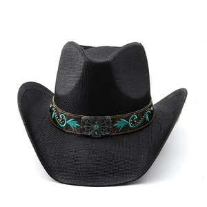 Close-up of black woven cowboy hat featuring a turquoise embroidery and metal butterfly buckle