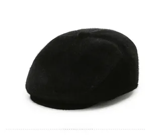 Detailed texture of black plush flat cap with faux fur material for winter warmth