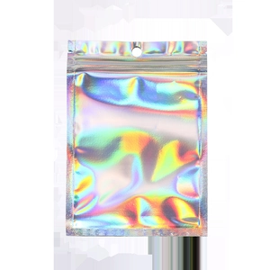 Macro shot of iridescent laser ziplock bag showing colorful reflective holographic foil texture