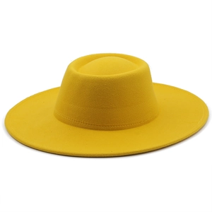 Detail of solid yellow wool felt fedora with 9.5cm wide brim and reinforced stitching