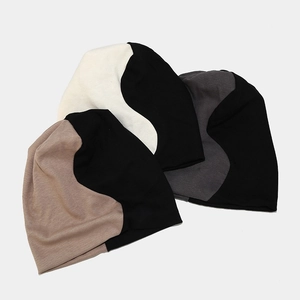 Fall knitted two-tone S-curve patchwork beanies in beige, grey, and brown combinations