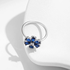 Exquisite S925 sterling silver ring with blue flower gemstone and diamond accent