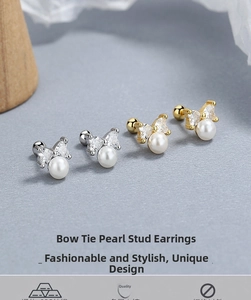 Macro detail of 925 silver bow stud earrings with pearls and crystals in gold and silver
