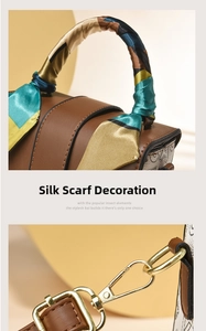 Detail of cute rabbit handbag featuring colored silk scarf handle and golden metal buckles
