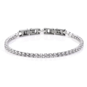 Macro view of silver stainless steel tennis bracelet with clear round cubic zirconia stones