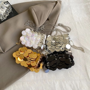 Set of four stylish sequin crossbody bags in white silver gold and black with chain straps