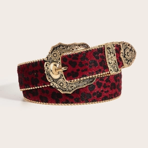 Red leopard print belt with gold carved buckle and chain edge decoration in studio shot