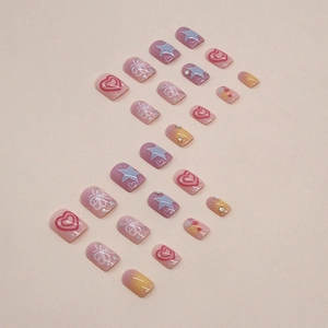 Square gradient press-on nails with heart, star designs and floral rhinestone accents
