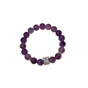 Elegant purple agate bracelet featuring crystal beads and a sparkling zircon centerpiece
