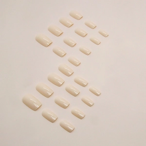 Glossy creamy yellow square-round false nails 24pcs set in minimalist layout