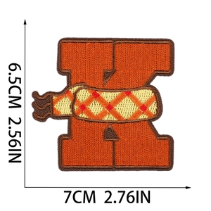 Detailed size view of embroidered letter K patch with fall scarf pattern and dimensions