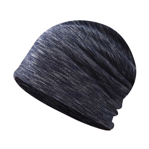 Detail view of the breathable dark blue and grey marl knitted cotton slouchy beanie hat