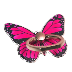 Macro detail of butterfly phone ring holder in pink with rose gold rotating metal ring