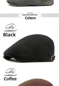 Detail view of cotton newsboy caps in black and coffee with metal adjustment buckles