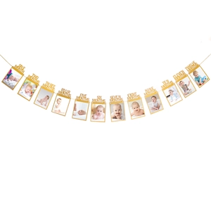 Detail of glitter gold 12-month baby photo banner for first birthday party decoration