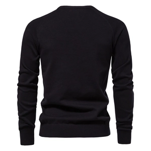 Rear view of black crew neck knit sweater with ribbed cuffs and hem on white background