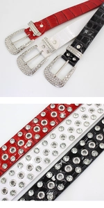 Detail of rhinestone studded crocodile pattern leather belts with luxury alloy buckle sets